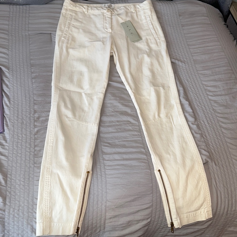 Off white jeans, zipper at the bottom, new still has tags